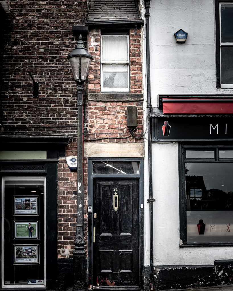 Extremely narrow Georgian infill building with black door and KeySafe near Elvet Bridge, Durham by Michael Dutson Landscape Photography